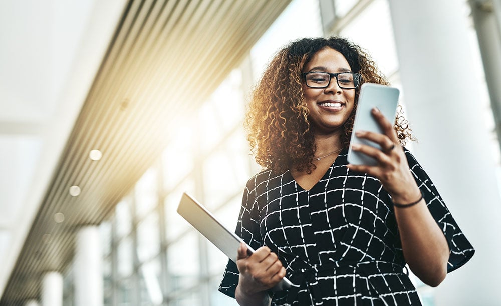 Businesswoman looking at mobile